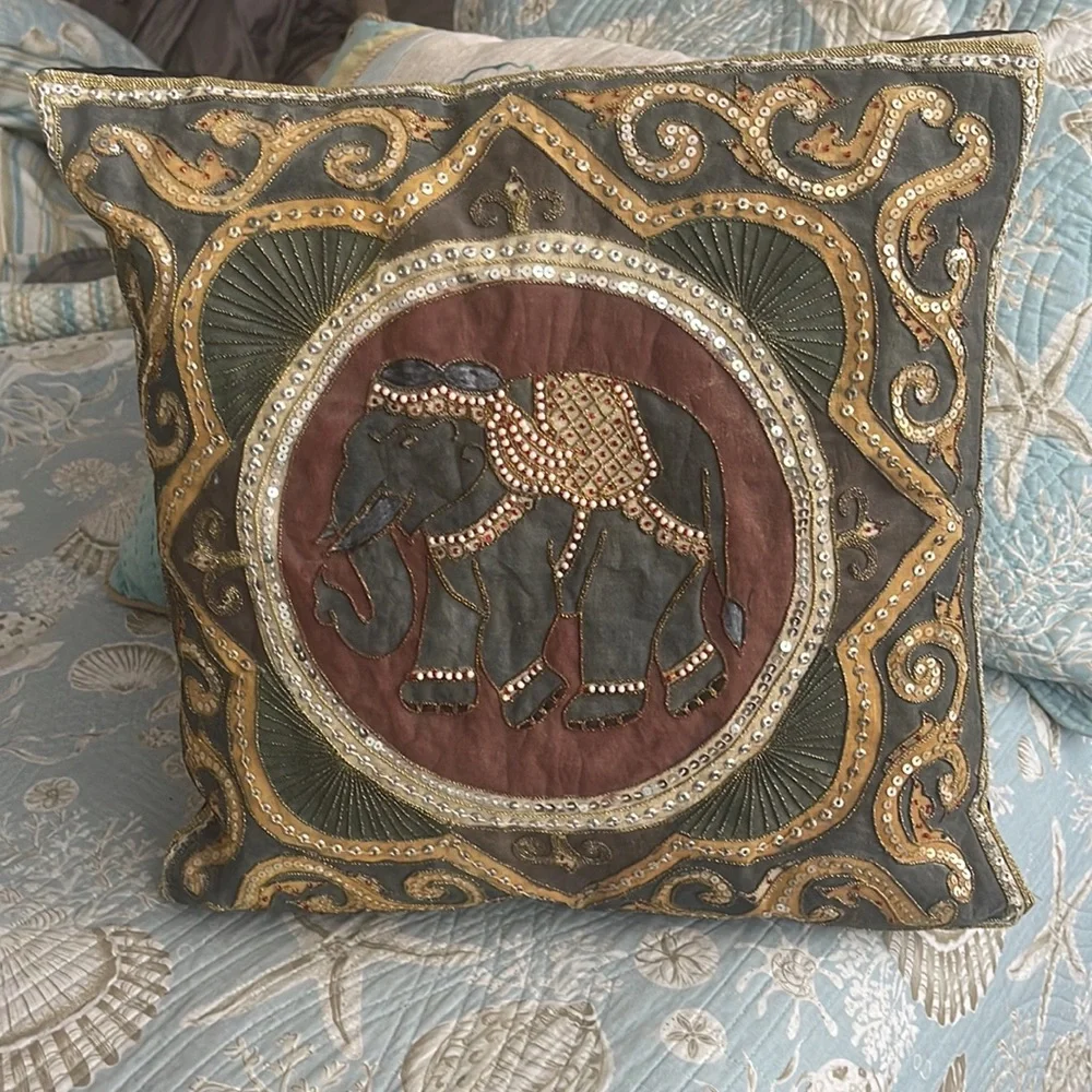Elephant lovers this pillow is lovely exotic and quite intricate black silk back